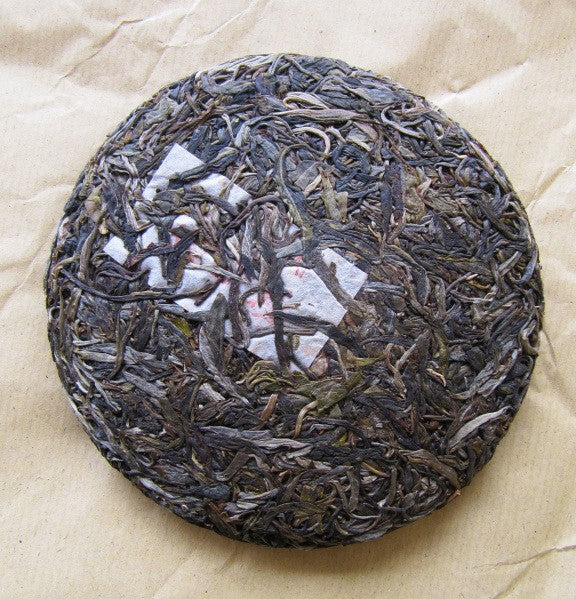 Galette de face - Puer Sheng BanPoZhai 250g [photo Cream of Banna]