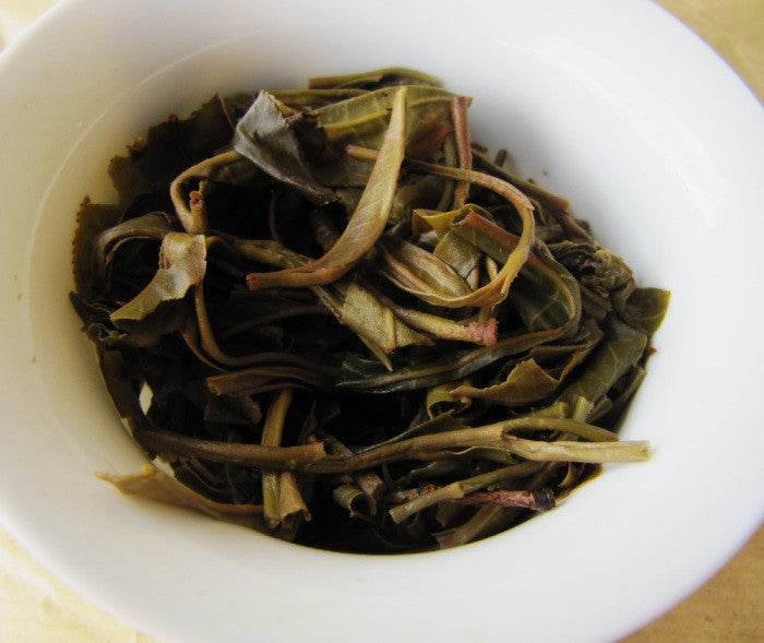 Feuilles infusées - Puer Sheng BanPoZhai 250g [photo Cream of Banna]