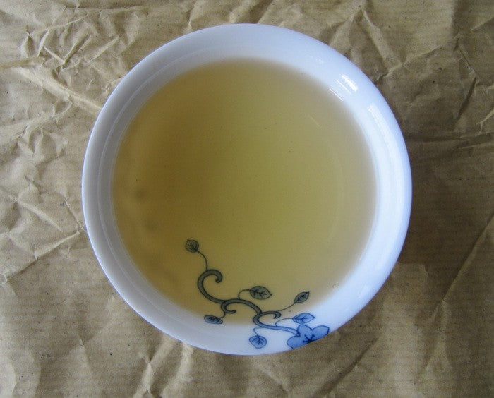 Infusion - Puer Sheng ManZhuan 250g [photo: Cream of Banna]